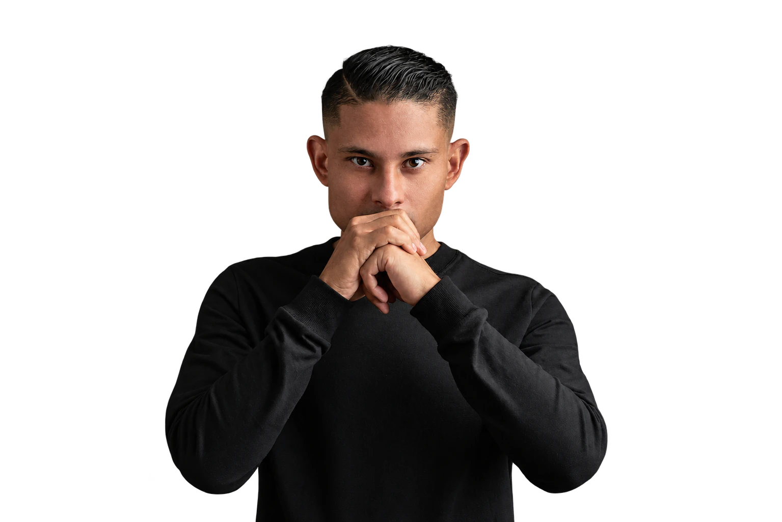 Bruno Stephen in a black sweatshirt, hands clasped in front of the mouth, looking straight at the camera