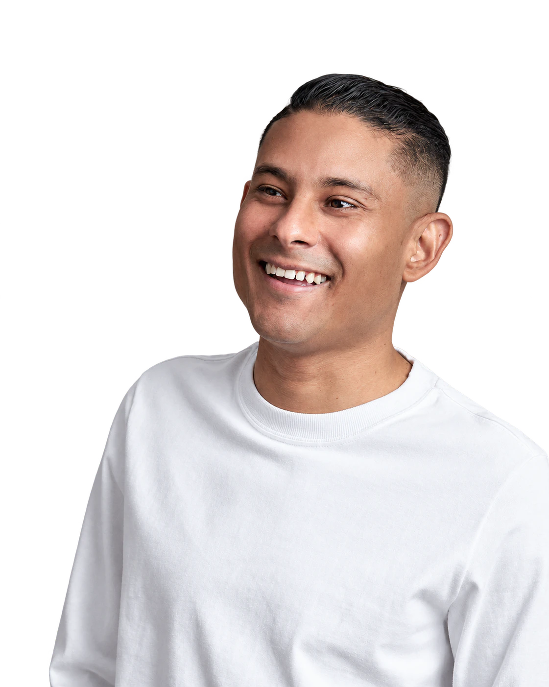 Bruno Stephen in a white top, laughing and looking to the side